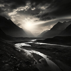 Fototapeta na wymiar Fotografia en blanco y negro con detalle de paisaje natural con rios y montañas, al amanecer