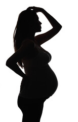 Silhouette of the pregnant woman