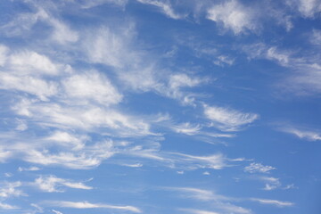 Wispy clouds in blue sky