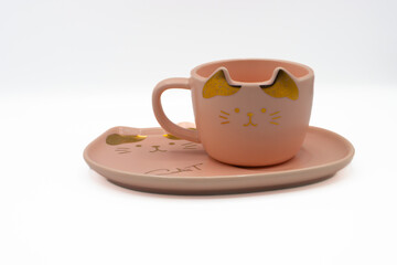 Cute cat tea, coffee cup on a saucer