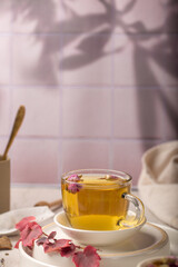 Cup of aromatic freshly brewed herbal tea 