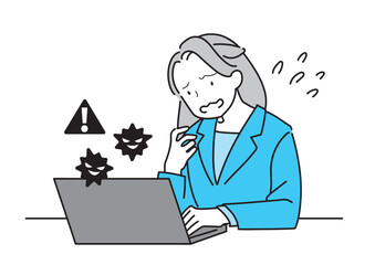コンピューターウィルスに攻撃され慌てるスーツの女性