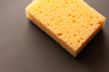 Cleaning sponges on a gray background. Cleaning concept, cleaning service.Top view