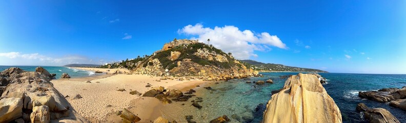 panorama view at the Cabo Plata with cliff, rocks and a wonderful beach at the coast of the...