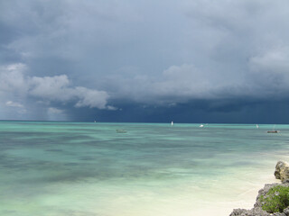 Fototapeta na wymiar Breathtaking view from Nungwi beach, Zanzibar, Tanzania, of Indian Ocean on a stormy day