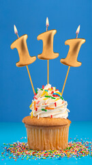 Birthday cake with candle number 111 - Blue background