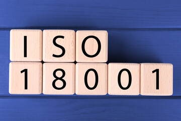 International Organization for Standardization. Cubes with abbreviation ISO and number 18001 on...