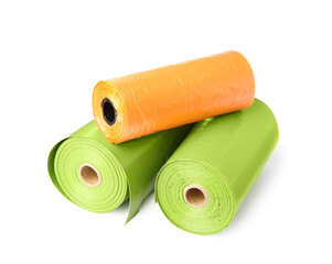 Colorful dog waste bags on white background