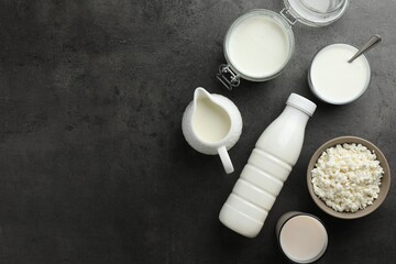 Many different lactose free dairy products on grey textured table, flat lay. Space for text - obrazy, fototapety, plakaty