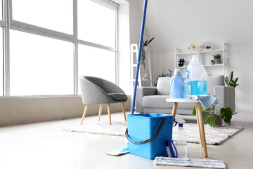 Table with cleaning supplies in living room