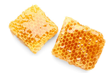 Sweet honeycombs on white background