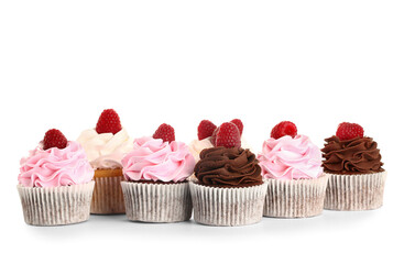 Tasty cupcakes with raspberries on white background