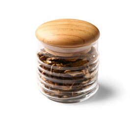 Jar with tasty dried mushrooms on white background