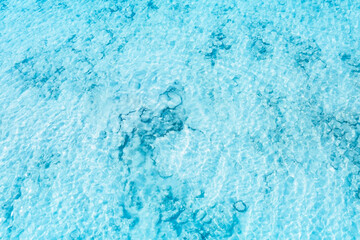 Fototapeta na wymiar Tropical beach water with crystal clear water on beach background