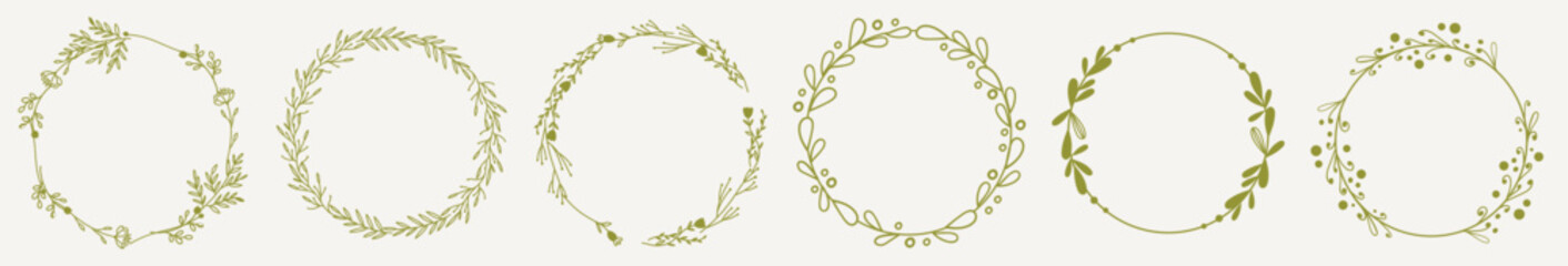 Vector set of golden hand drawn ink floral wreaths. A set of decorative circular floral frames.