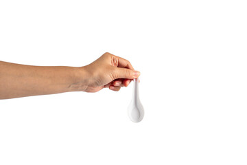 White plastic soup spoon in hand on transparent background