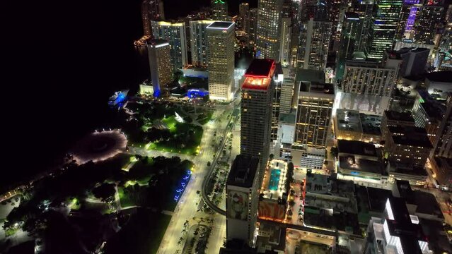 Miami's nighttime allure unfolds in this aerial view, showcasing landmark buildings and the vibrant city traffic.