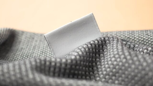 empty white label on a cloth 