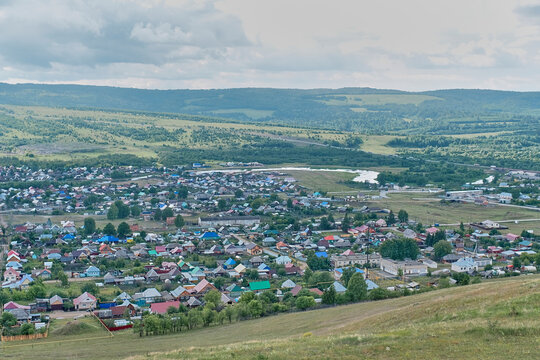 Town Sim lies in valley of western slopes of Ural ridget, Russia. Summer landscape.
