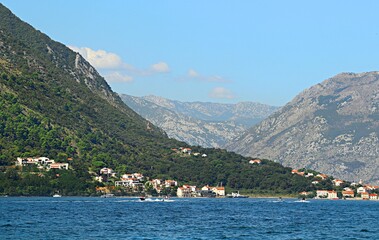 View of the resort villages, barks and the Bay of Kotor of the Adriatic Sea