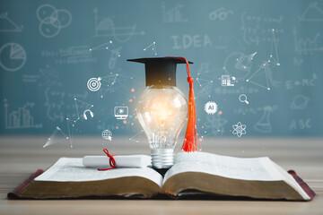 Education learning and Idea knowledge concepts innovative technology, science, and mathematics in school or university. Graduation cap with a lightbulb on the book and icon learning in the classroom.  - Powered by Adobe