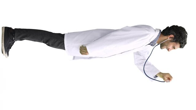 male doctor in a white coat on a white background demonstrates a statoscope