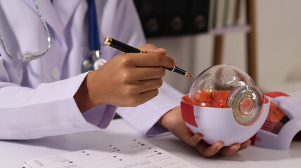 Initial AI illustration of a close-up of a female doctor's hand signing a medical document on a...