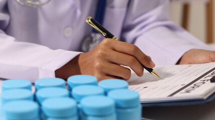 Initial AI illustration of a close-up of a female doctor's hand signing a medical document on a...