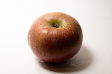Perfect Fresh Red Apple Isolated on White Background in Full Depth of Field with Clipping Path.