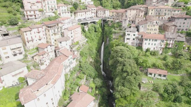 Aerial shot of the Small Village of Nesso and Waterfall, on Lake Como - Italy