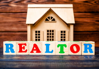 Wooden home and text on the realtor
