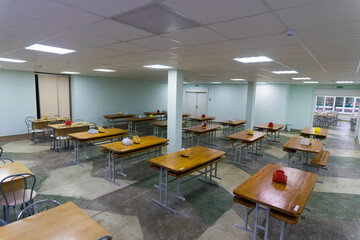 Cafeteria, dining room in university, cafe with tables and chairs, counter bar hotel.