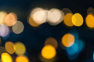 Abstract orange color circular bokeh from light for background. Blur background
