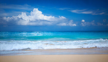 Fototapeta na wymiar tropical beach scene: azure ocean, sunny sky, and sandy shore, evoking relaxation and serenity
