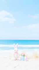 A plush rabbit beside patterned Easter eggs on sunny beach