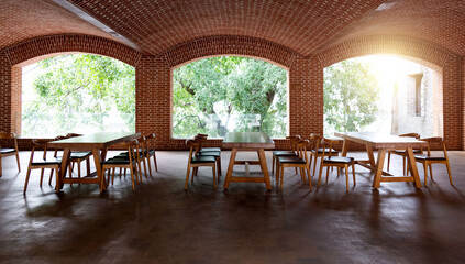 Red brick restaurant with tables and chairs