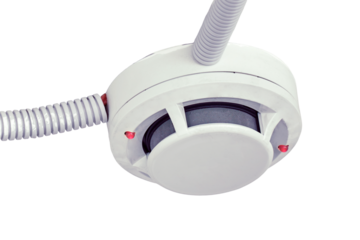 Flashing red lights fire alarm system on the ceiling in the room building, isolated on a white background. Smoke detector fire alarm sensor