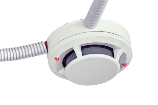 Flashing red lights fire alarm system on the ceiling in the room building, isolated on a white background. Smoke detector fire alarm sensor