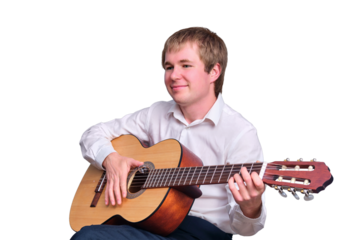 Portrait of a happy blond man with an acoustic guitar, isolated on a white background
