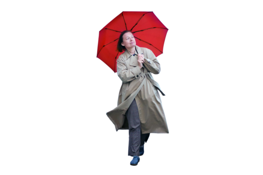 A woman with a red umbrella walks along, isolated on a white background