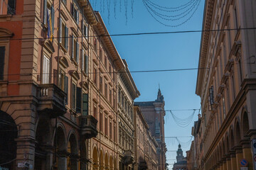Naklejka premium Bologna capital of the Emilia Romagna region urban architecture images historical buildings two towers Maggiore square San Petriono basilica