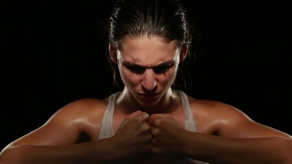 Intense Female Fighter Yelling with Ferocity and Focus During Training, Motivated, Screaming with Passion and Strength