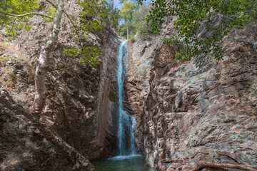 Millomeris waterfall in the mountains of Troodos on the island of Cyprus. Mediterranean Sea. Europe.