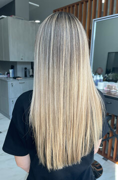 Long hair dyeing in air touch or shatush technique. Look from behind