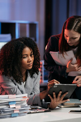 Businessmen team or financial data analysts working with tablets and laptop computers and data graphs together. Plan to analyzing projects in the office.