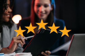 Satisfaction concept. Woman choosing with tick five star rating on digital tablet.