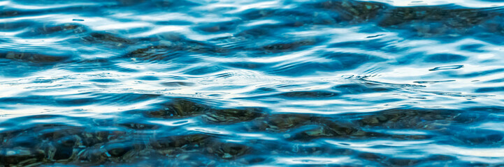 Beautiul blue water and small waves
