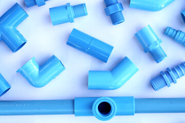 Blue pvc pipe connections for plumbing work. Plumber equipment