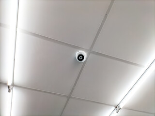 CCTV cameras are installed on the ceiling inside the building to monitor internal security.