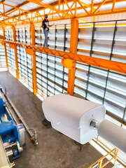 Installation of CCTV cameras within industrial factories To observe the operation of the machinery.